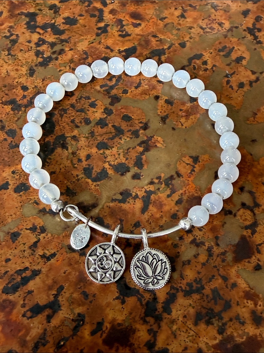 Chrysalis Beaded Translucent Gray Chalcedony Bracelet with Lotus & Sun Charms